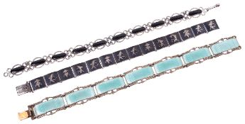 A Norwegian 'Hestenes' silver gilt and enamel bracelet and two other bracelets