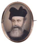 A fine portrait miniature on ivory of a bearded gentleman, possibly Russian orthodox