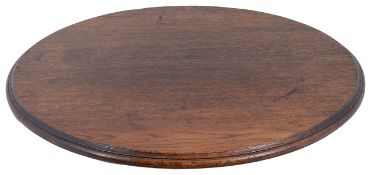 A 19th/20th century oak topped 'lazy susan'