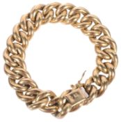 An 18ct gold hollow large link curb link bracelet