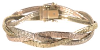 A contemporary three colour gold plaited articulated bracelet