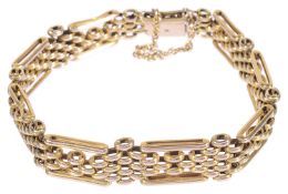 A narrow Edwardian 9ct rose gold gate bracelet