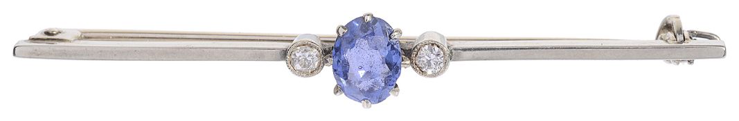 An early 20th century white coloured metal sapphire and diamond bar brooch