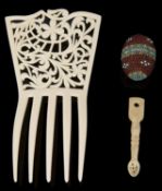 A large late 19th century ivorine hair comb