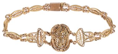 A gold Egyptian filigree 'scarab' bracelet