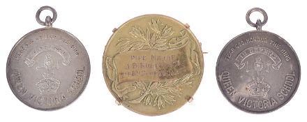 A 9ct gold piping medal awarded to Pipe Major J. B. Robertson in 1935
