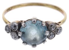 An attractive 1920s blue zircon and diamond ring