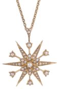 A delicate Vict. gold and seed pearl set star pendant / hair piece