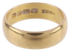 A plain 22ct gold wedding band