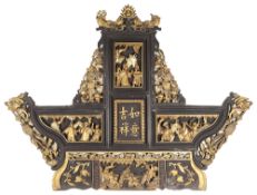 A 19th c. Chinese carved lacquered wood and gilt temple carving