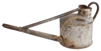 A vintage galvanised watering can