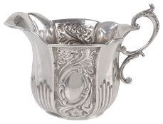 A Victorian silver cream jug, hallmarked Birmingham 1893