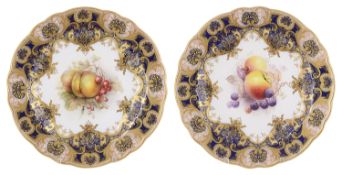 A pair of Royal Worcester porcelain cabinet plates, circa 1912