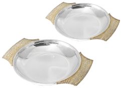Stuart Leslie Devlin parcel-gilt-silver twin handled entree dishes, hallmarked London 1976