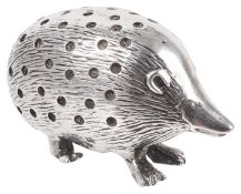 An Edwardian silver novelty hedgehog pin cushion, hallmarked Birmingham 1904