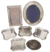 A set of four Art Deco silver trays, hallmarked London 1928 & 1930