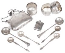 A collection of Victorian and later silver, napkin rings, vesta case, spoons and purse