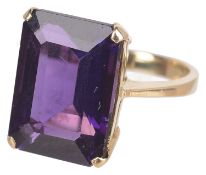 A large Continental rectangular cut single stone amethyst set ring