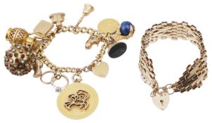 A 9ct gold curb link charm bracelet