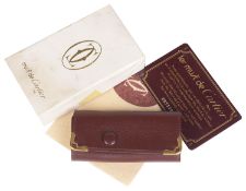 Must de Cartier red leather key holder