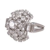 A Continental diamond set platinum mounted cocktail ring of bombe form