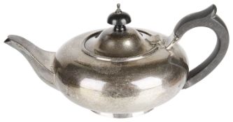A George V silver bachelor's teapot, hallmarked London 1928