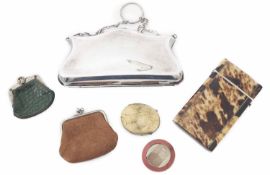 A small collection of purses and other items