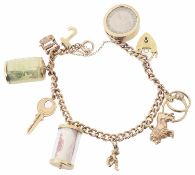 A 9ct rose gold curb link charm bracelet with heart padlock fastening