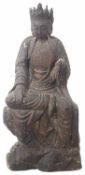 Chinese Ming Dynasty lacquered carved wood seated figure of Guan Yin