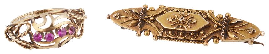 A Victorian Etruscan style thread work brooch and a ruby set ring
