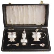 A cased three piece silver cruet set, Birmingham 1964/1965/1967