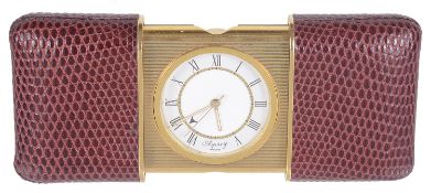 An Asprey Movado style travelling alarm clock,