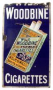 A vintage 'Wild Woodbines' enamelled advertising sign