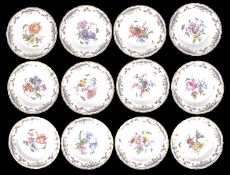 A suite of twelve KPM porcelain plates, late 19th century