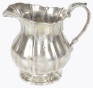 A Victorian Irish silver cream jug, hallmarked Dublin 1823