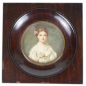 A late 19th century portrait miniature of a young woman on ivory