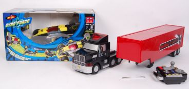 RADIO CONTROLLED LORRY AND SPIN MASTER CAR