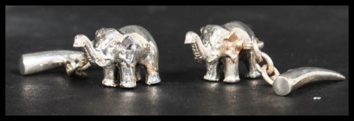 A pair of sterling silver cuff link cuffs in the f