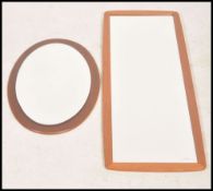 A vintage 20th century long teak wood wall mirror