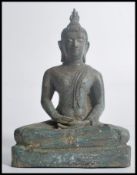 A 19th century Oriental Chinese bronze figurine of