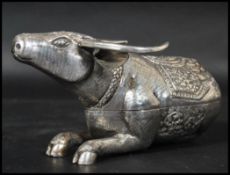 A Chinese silver lidded pot in the form of an Ox /