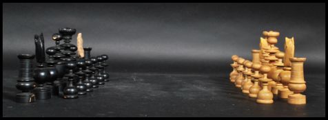 An early 20th century ebony painted boxwood chess