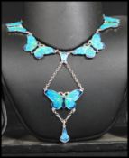 A sterling silver and enamel necklace chain having