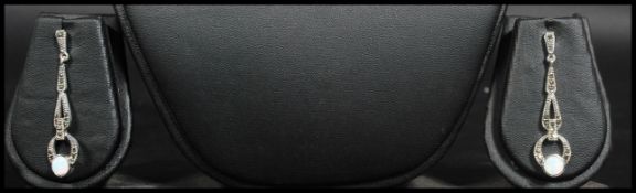 A pair of sterling silver and marcasite drop earri