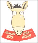 A 20th century wooden advertising sign in the form