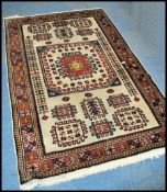 A 20th century Kelim woollen rug, on cream ground