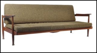 A Manhattan style sofa / day bed, by Guy Rodgers,