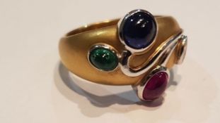 An 18ct yellow gold ruby, emerald, Sapphire and di