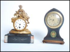 Two clock one being an early 20th century Edwardia