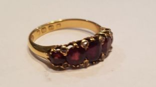 An 18ct antique garnet stone and diamond 5 stone r